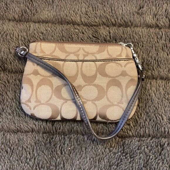 Coach Handbags - Coach Authentic Genuine Monogram Logo Fabric Wristlet Wallet Tan
